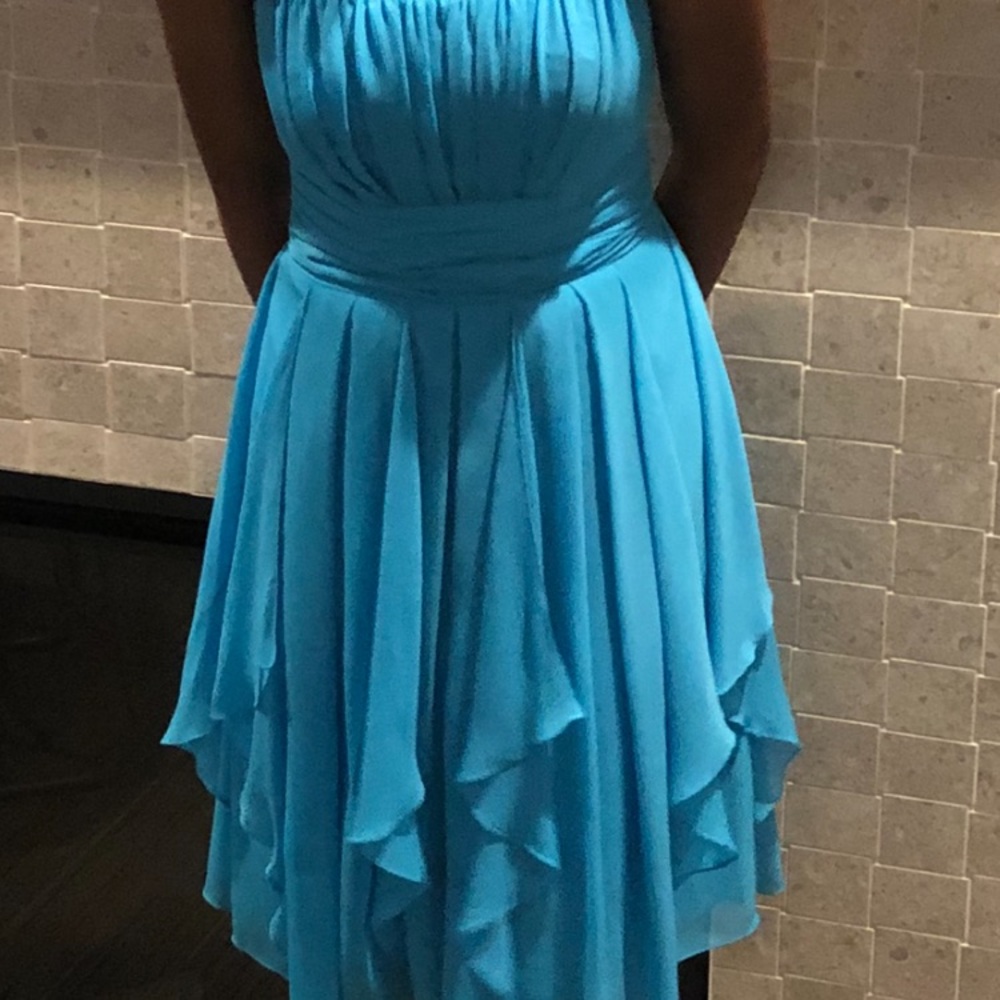 Teal strapless dress.